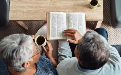 Seek the Comfort of the Scriptures: photo of two people studying the Bible